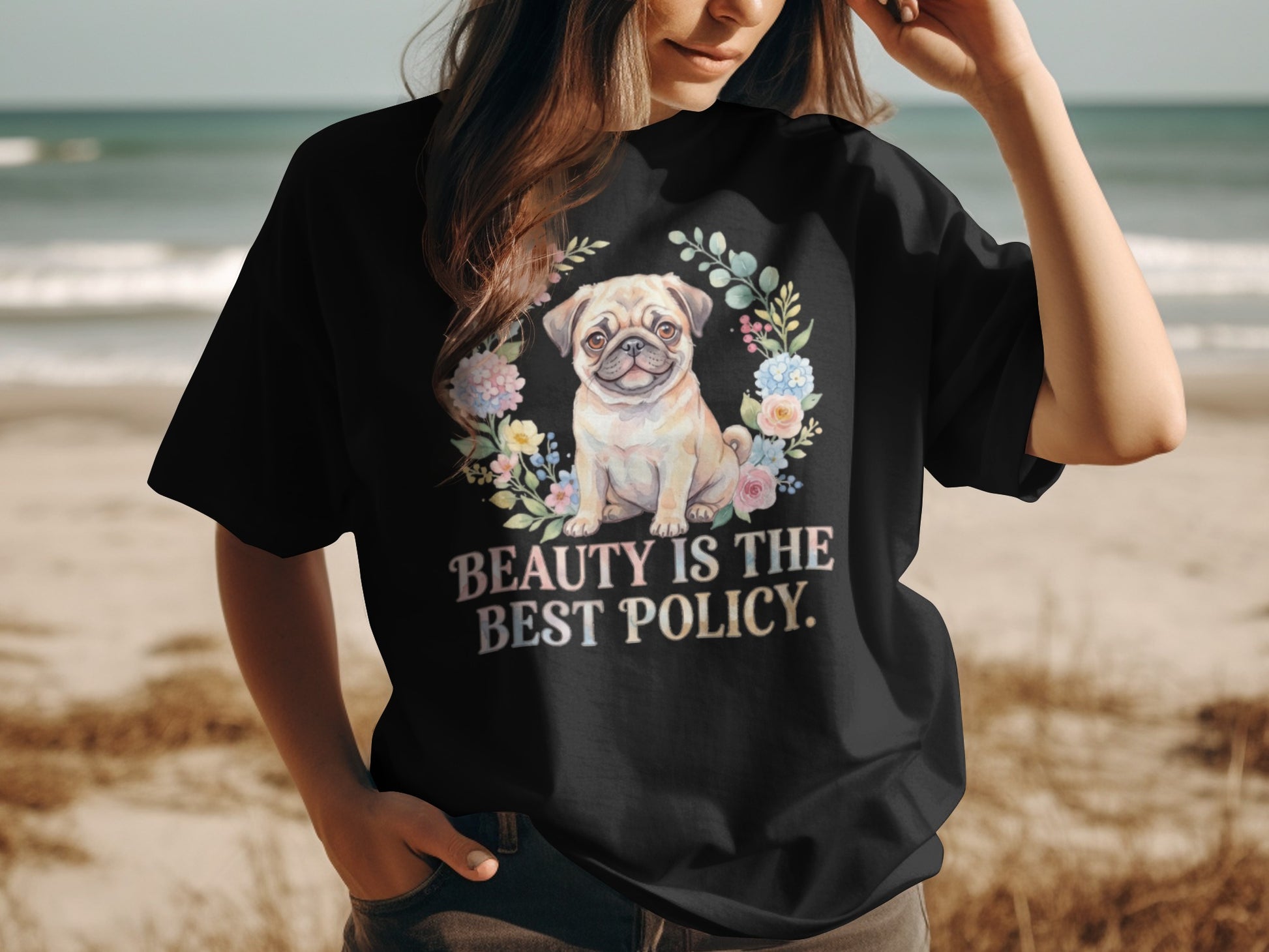 Black t-shirt with pug and floral wreath, text reads "Beauty is the best policy."