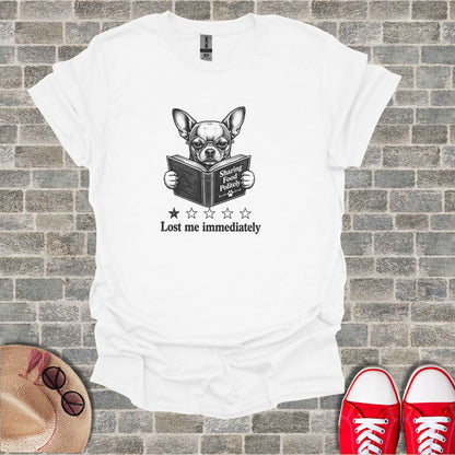 White t-shirt with chihuahua reading a book titled "Lost me immediately".