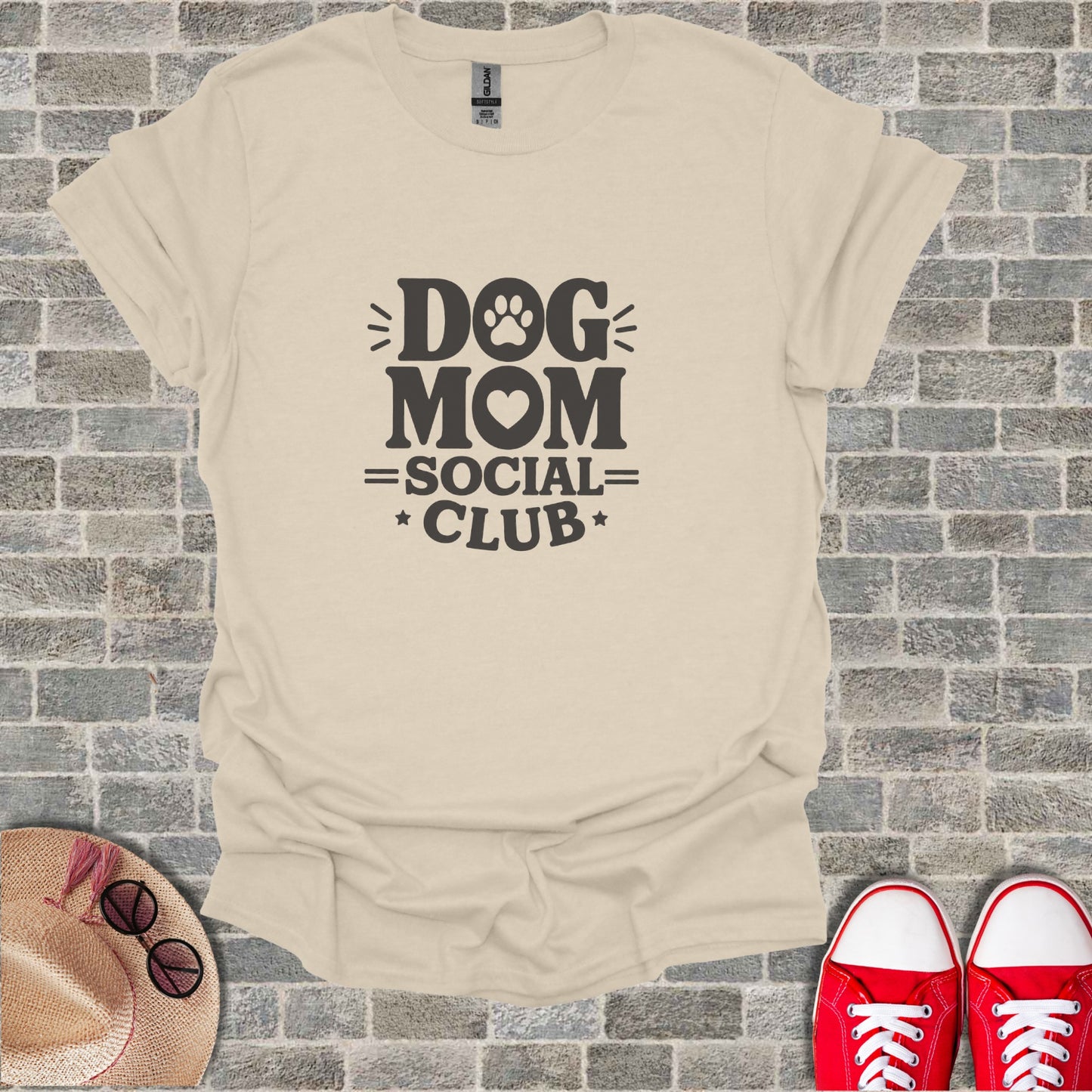 Cream t-shirt with "Dog Mom Social Club" text and paw print graphic.