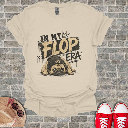 T-shirt with "IN MY FLOP ERA" text and a sad pug wearing a beanie.