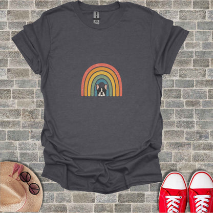 Dark gray t-shirt with a French bulldog peeking from behind a retro rainbow design.