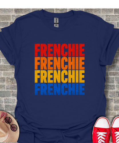 Navy t-shirt with "FRENCHIE" in stacked red, orange, yellow, and blue lettering.