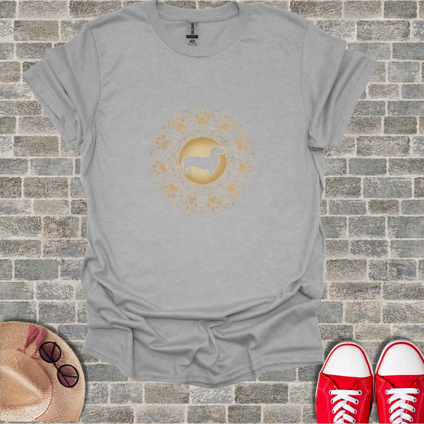 Grey t-shirt with golden dachshund mandala design on chest.