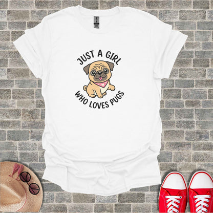 White t-shirt with a cartoon pug and text "Just a girl who loves pugs".