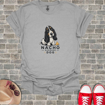 Basset hound wearing a bandana, text "NACHO AVERAGE DOG" with a cheese wedge.