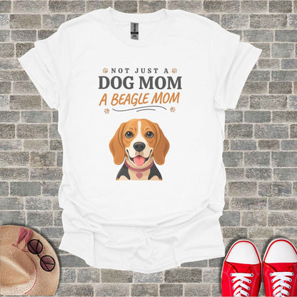 White t-shirt with beagle graphic and text "Not just a dog mom, a beagle mom".