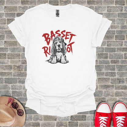White t-shirt with a sketch of a basset hound wearing a backwards baseball cap.
