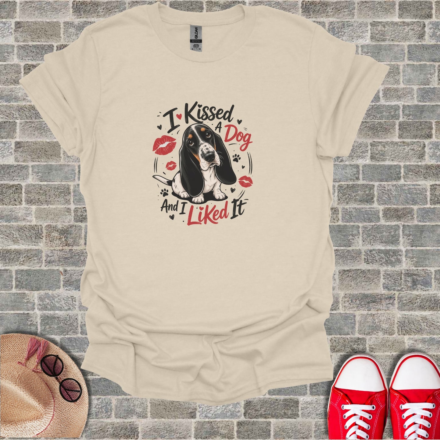Basset Hound wearing a collar, with "I Kissed A Dog And I Liked It" text.
