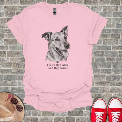 Pink t-shirt with a sketch of a dog and text "Fueled By Coffee And Dog Kisses."