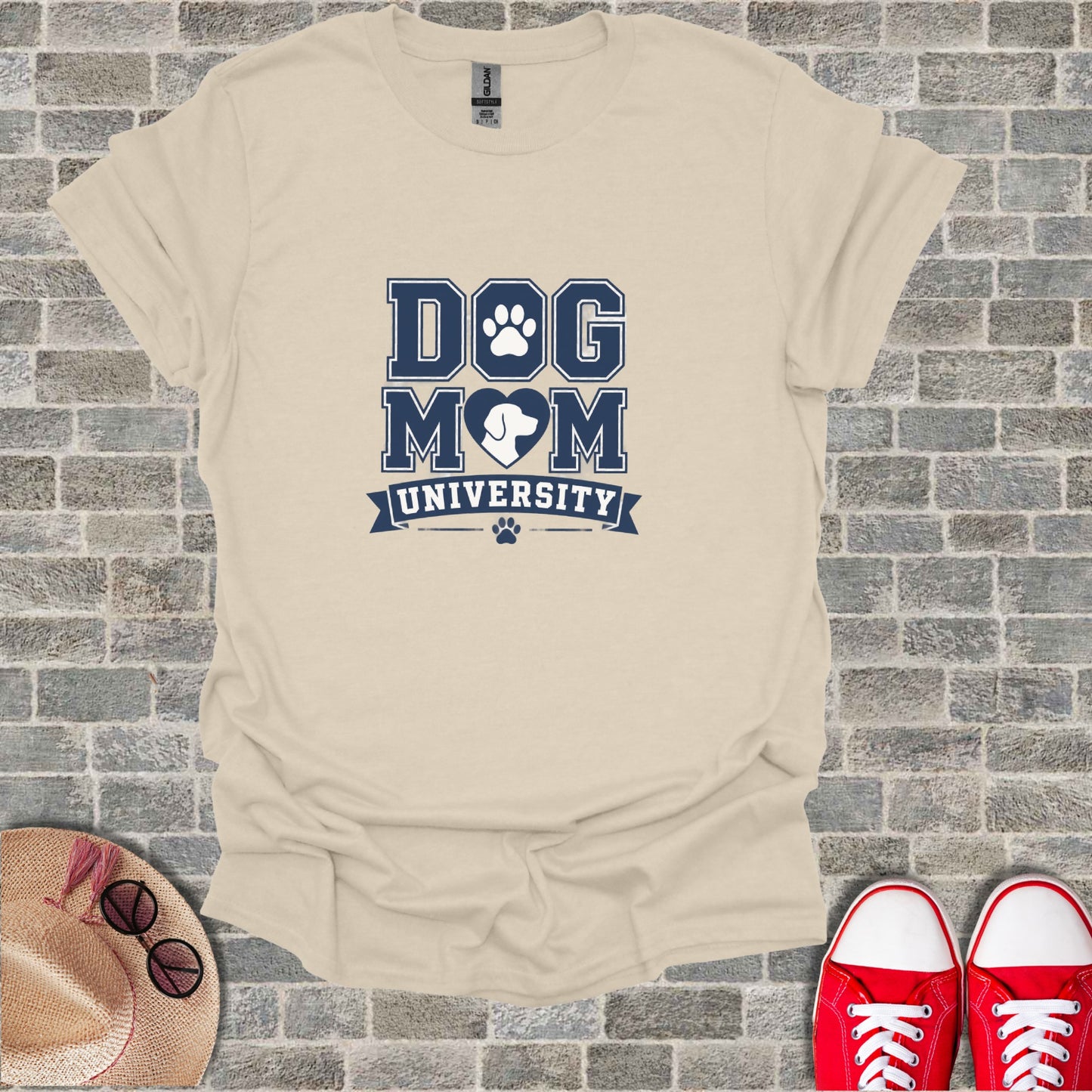 Cream t-shirt with "Dog Mom University" and paw print graphic.
