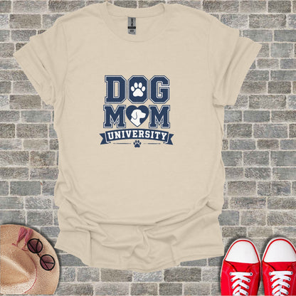 Cream t-shirt with "Dog Mom University" and paw print graphic.