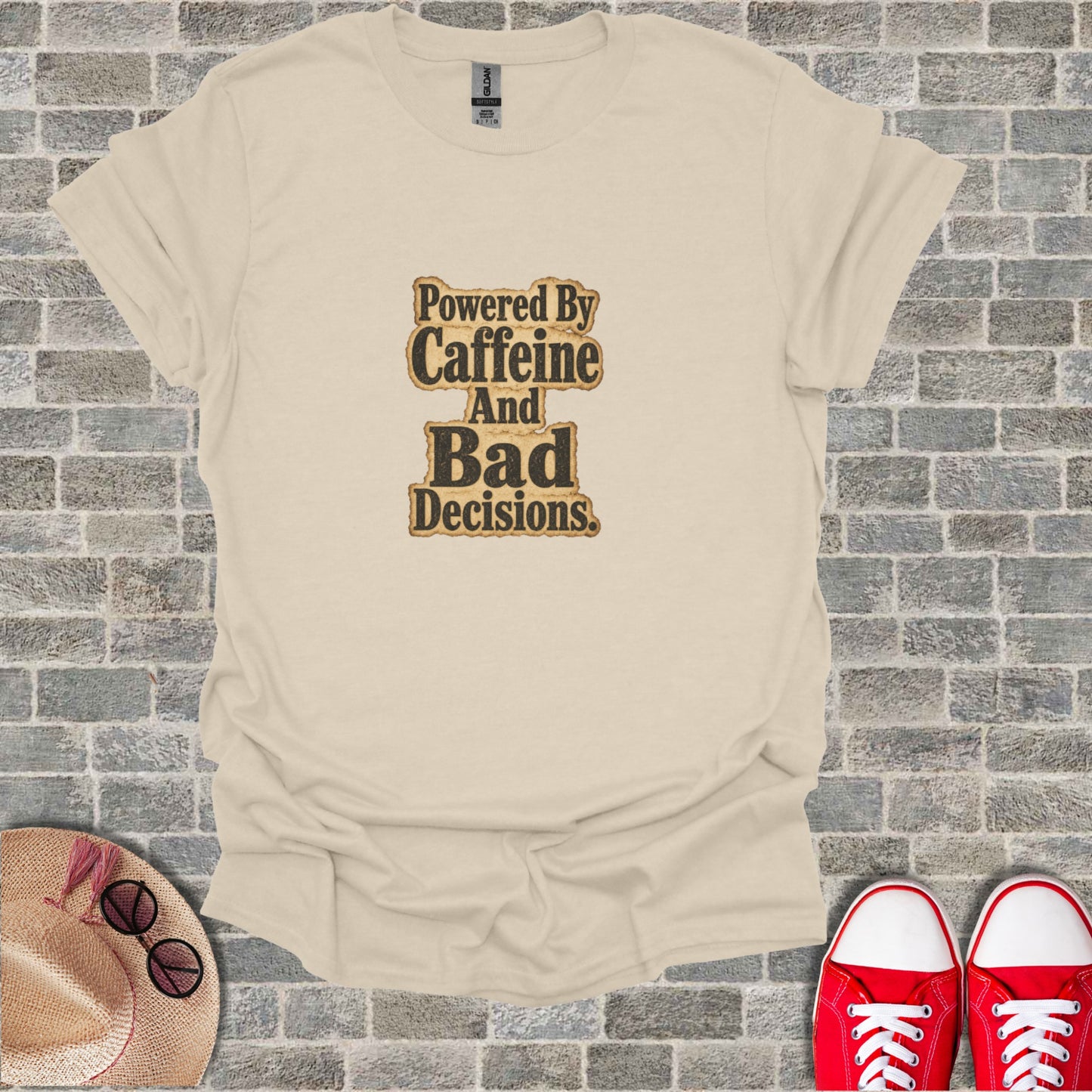 T-shirt with "Powered By Caffeine And Bad Decisions" text.