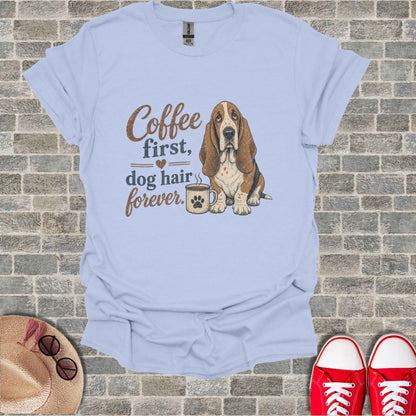 Basset hound and coffee cup graphic on light blue t-shirt.