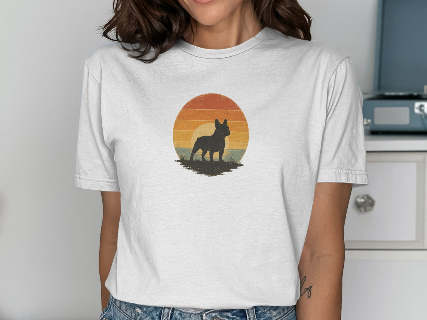 French Bulldog silhouette against a retro sunset graphic on a white t-shirt.