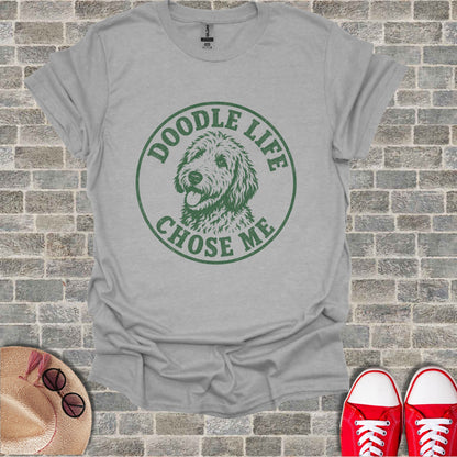 Grey t-shirt with green "DOODLE LIFE CHOSE ME" text and dog graphic.