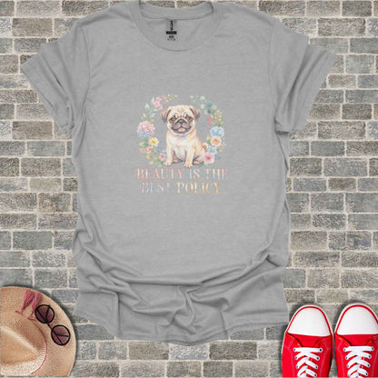 Grey t-shirt with watercolor pug in floral wreath and text "BEAUTY IS THE BEST POLICY."
