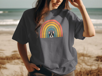Grey t-shirt with a French bulldog peeking from behind a colorful rainbow.