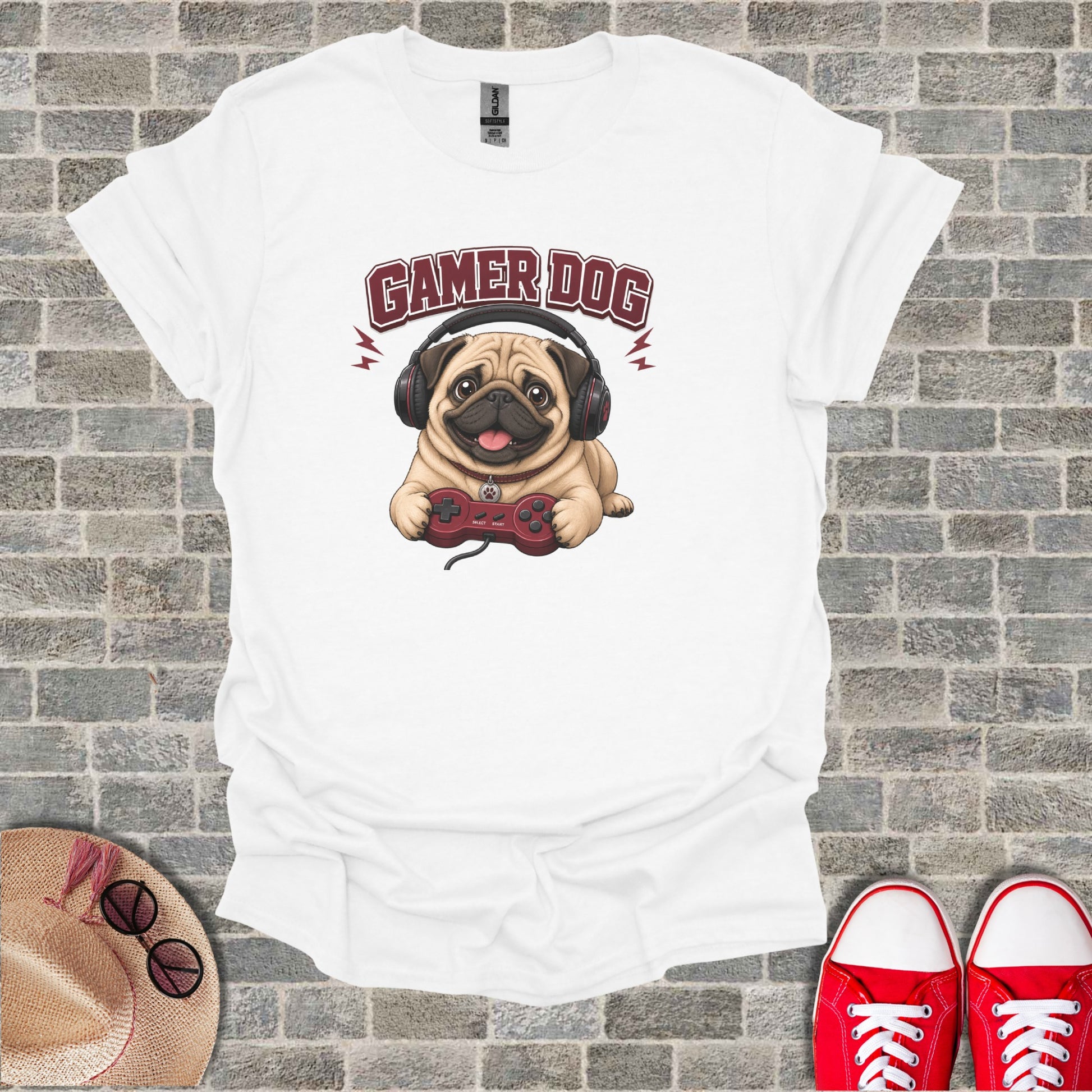 T-shirt with a pug wearing headphones and playing a video game.