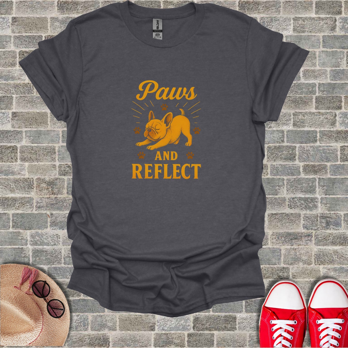 Dark grey t-shirt with "Paws AND REFLECT" text and a French bulldog.