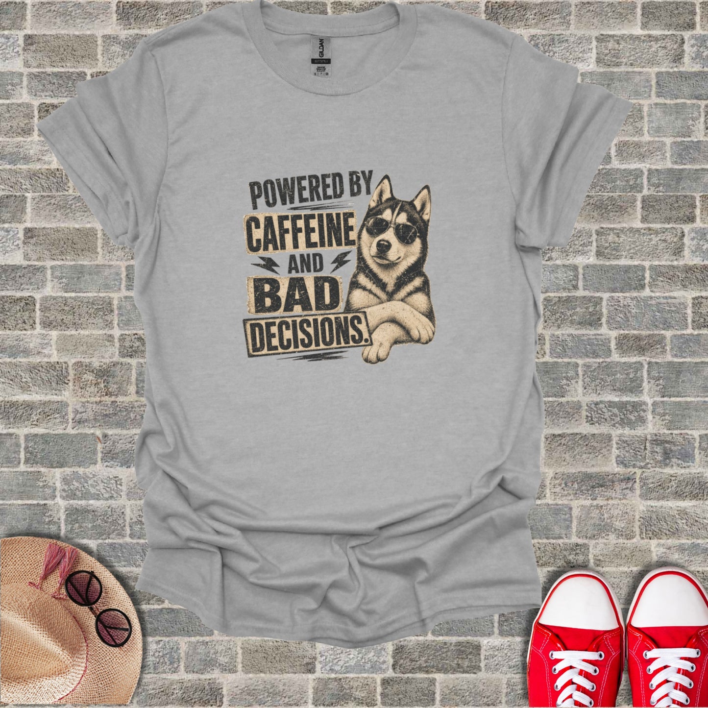 T-shirt with husky wearing sunglasses and text "POWERED BY CAFFEINE AND BAD DECISIONS".