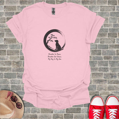 Pink t-shirt with Zen dog design and text "Breathe In Peace. Breathe Out Stress. My Dog Is My Zen."