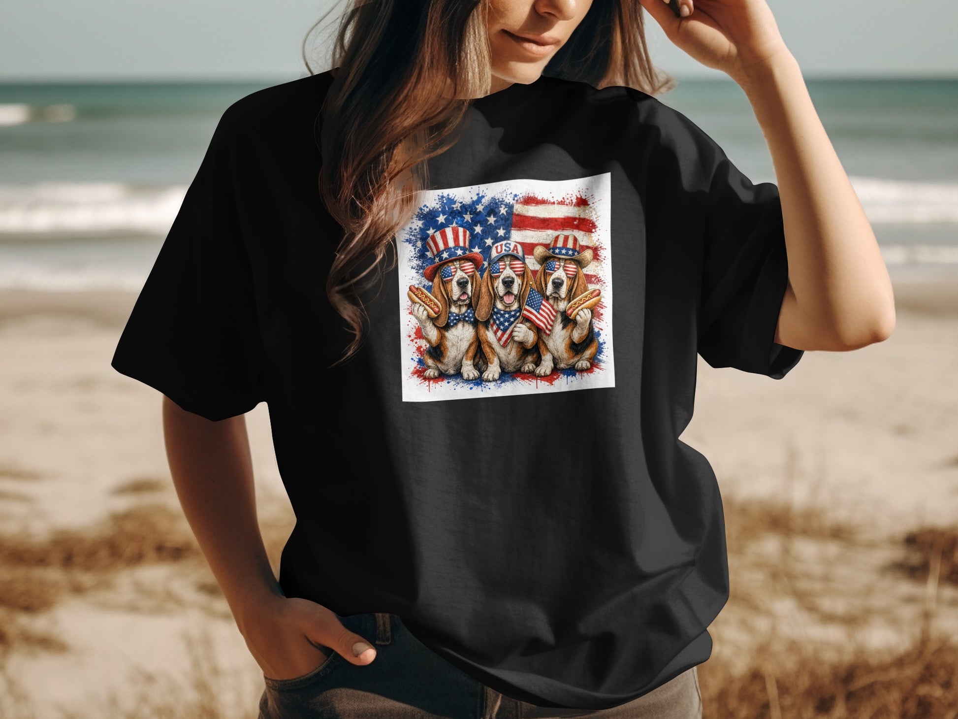 Three dogs wearing American flags and hot dog hats on a beach.