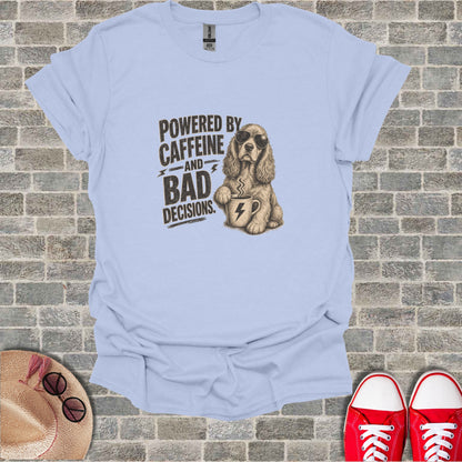 T-shirt with dog wearing sunglasses and holding coffee cup, text "Powered by Caffeine and Bad Decisions".