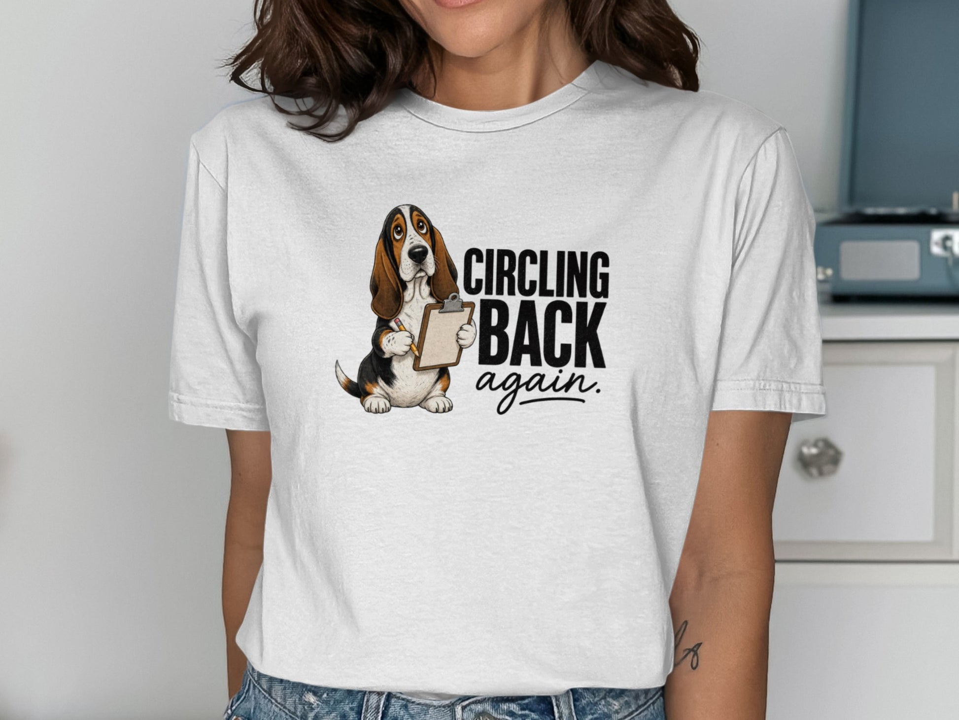 Basset hound with clipboard saying "Circling back again."