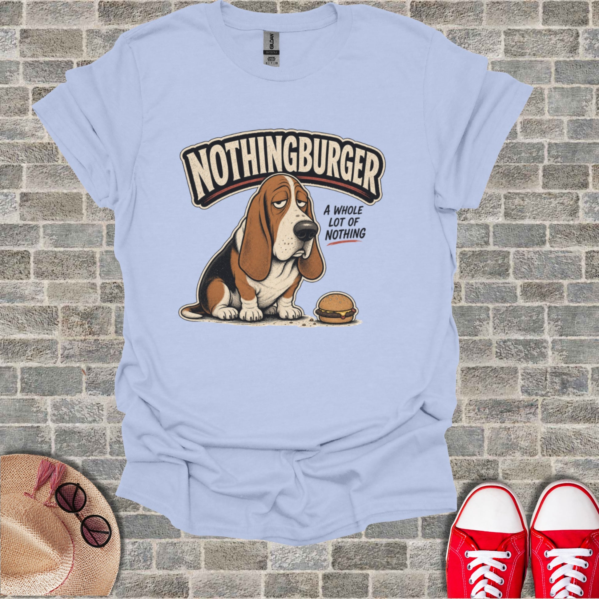 Light blue t-shirt with cartoon Basset Hound and "NOTHINGBURGER" text.