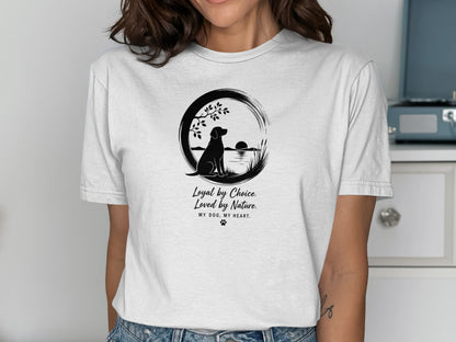 T-shirt with a serene dog silhouette overlooking water at sunset.