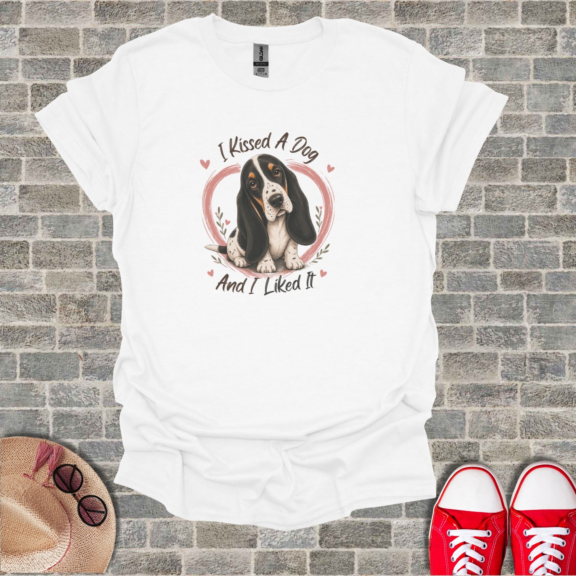 White t-shirt with a basset hound and "I Kissed a Dog And I Liked It" text.