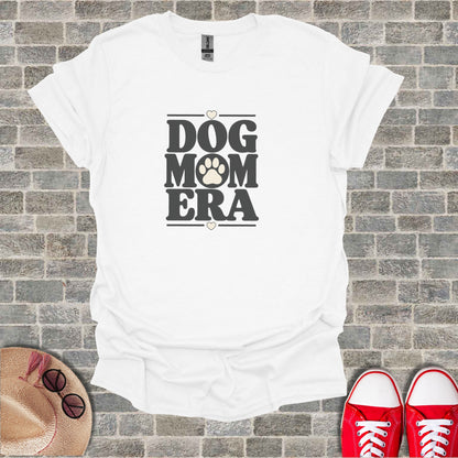 White t-shirt with "DOG MOM ERA" text and paw print.