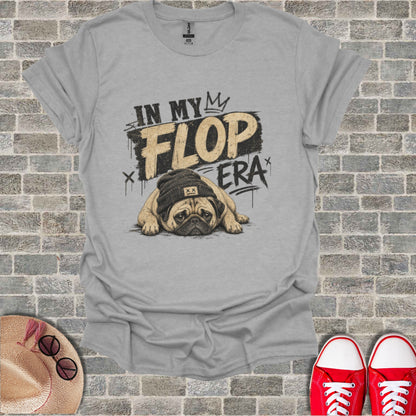 Pug wearing a beanie with "In My Flop Era" text across its chest.