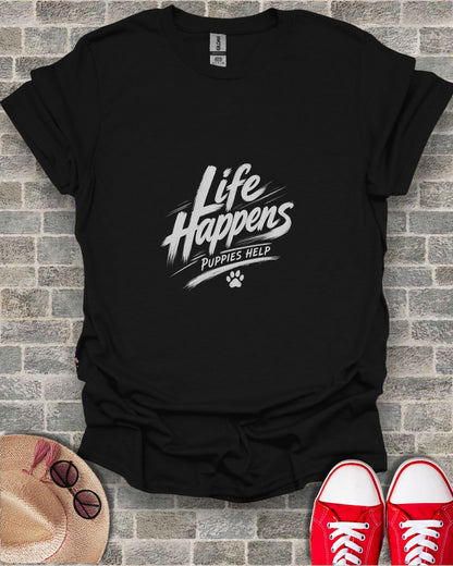 Black t-shirt with white text "Life Happens Puppies Help" and a paw print.