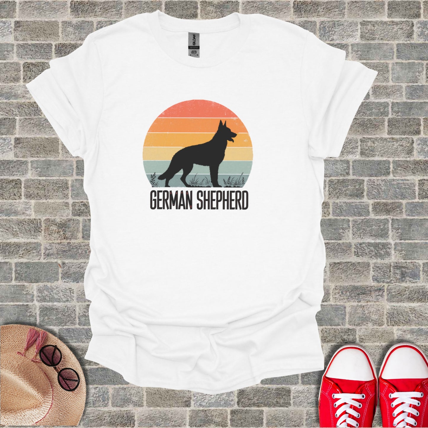 White t-shirt with a German Shepherd silhouette and sunset graphic.